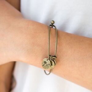 Brass dandelion blowing in the wind bangle bracelet